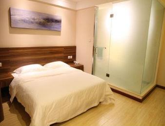 Super 8 Yantai Train Station Dayue Cheng Hotel Quarto foto